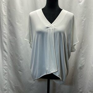 Peruvian Connection Flowing V-Neck Top
XS